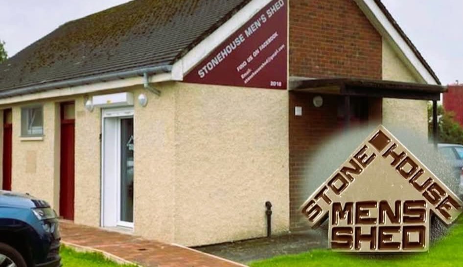 Men from Stonehouse Men's Shed working on a project